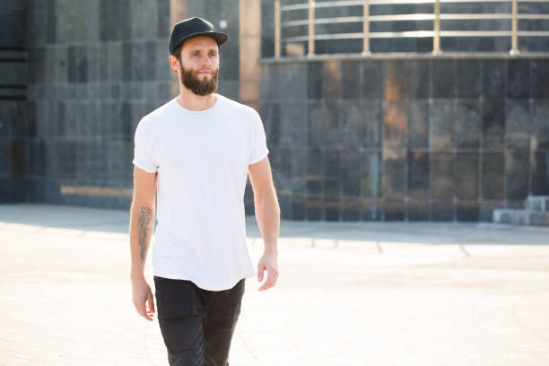 istock Hipster handsome male model with beard wearing white blank t-shirt 858165568