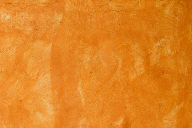 текстура оранжевой стены - mexico стоковые фото и изображения