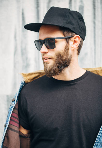 istock Handsome hipster man smiling wearing trendy jeans clothes 858166266