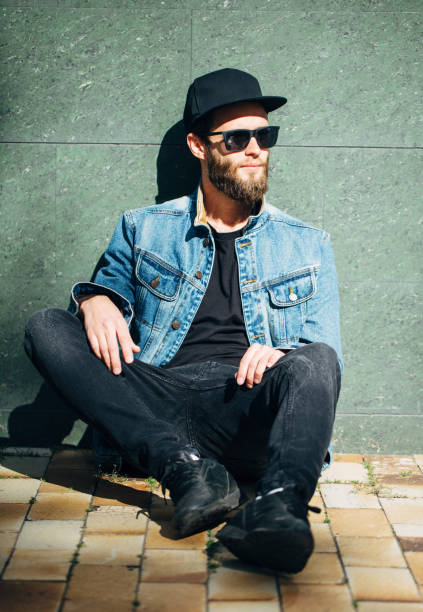 istock Handsome hipster man smiling wearing trendy jeans clothes 858166330
