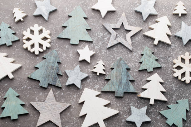 istock Christmas wooden decor on the snow background. 858169268