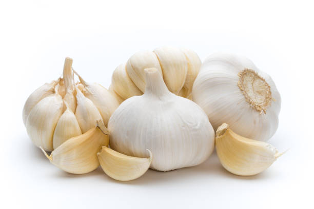 istock Garlic isolated on the white background. 858171910
