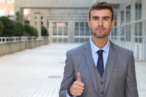 istock Businessman showing a thumbs up 858172500