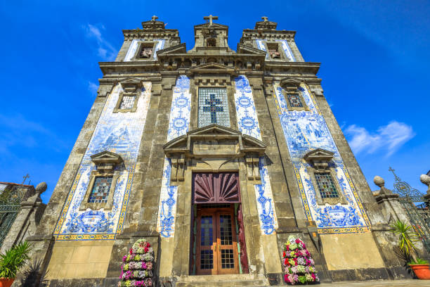 Saint Ildefonso church The two bell towers and azulejo tiles covering the facade of famous Saint Ildefonso church near Batalha Square in Porto, Portugal. The Igreja de Santo Ildefonso is an eighteenth-century church. batalha photos stock pictures, royalty-free photos & images