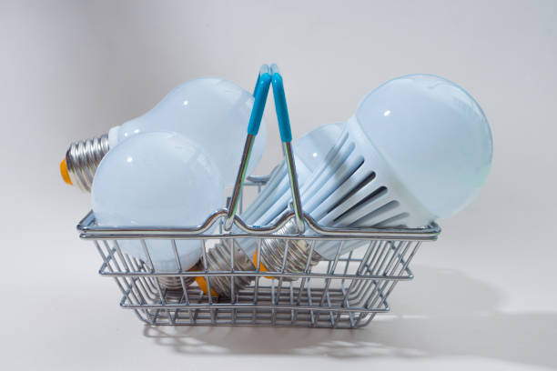 istock Light Bulbs and Mini shopping basket 858177146
