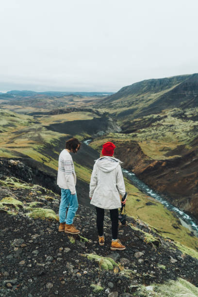 istock Two women walking near Haifoss  valley in mountains 858180742