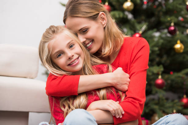 istock embracing mother and daughter 858192084