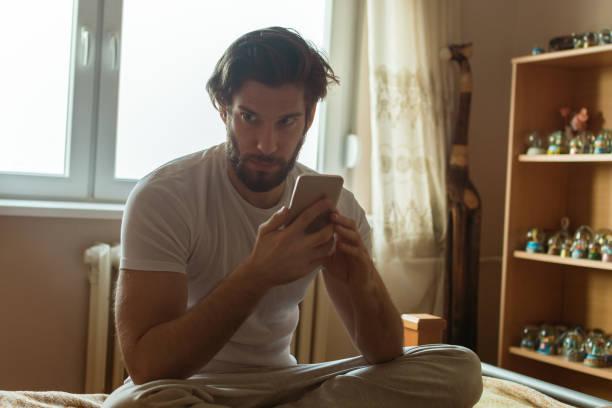 istock Checking messages early in the morning 858196748