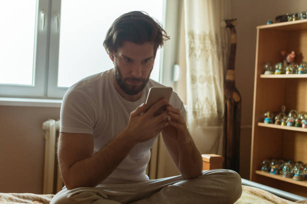 istock Checking messages early in the morning 858196758