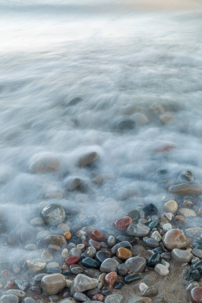 istock Waves rushing over stones on a Lake Huron beach 858197824