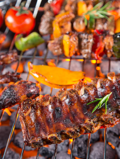 istock Barbecue grill with various kinds of meat 858215476