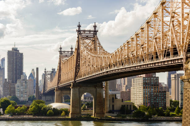 Queensboro Bridge Daylight Queensboro bridge on a bright sunny day queens new york city stock pictures, royalty-free photos & images