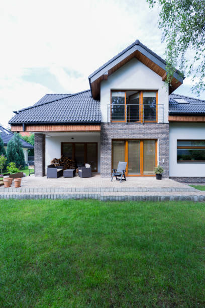 istock House with brick walls and patio 858216546