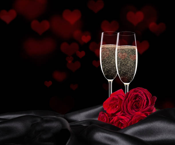 Sparkling valentine day with champagne and roses, close-up.