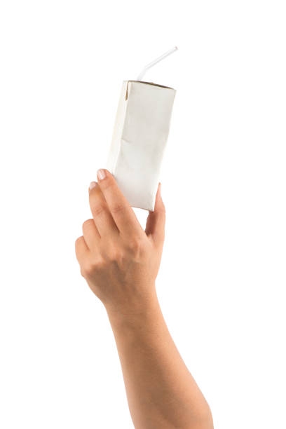 recycling hand holding uht carton drink box