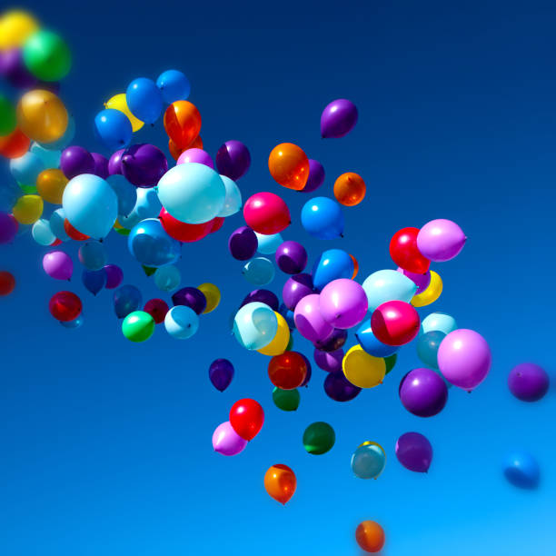 istock Colorful Balloons flying in the sky party 858224714