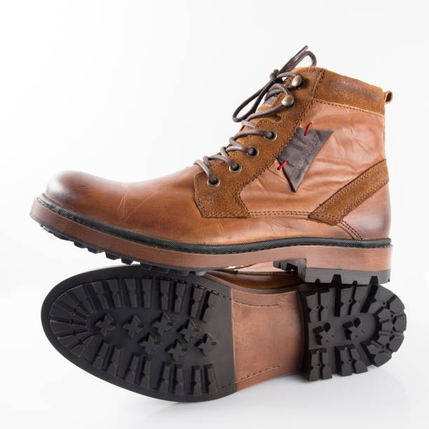 istock Male Brown Leather Boot on White Background 858233426
