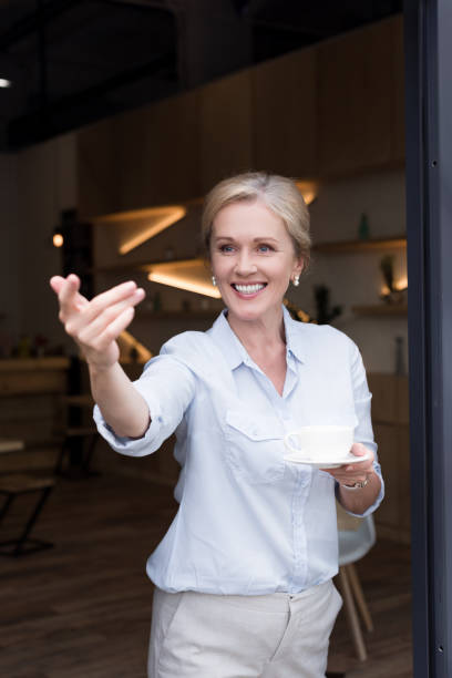 istock mature woman drinking coffee 858236378