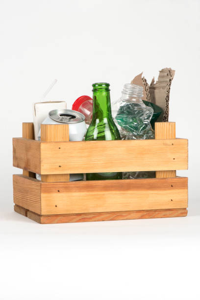 istock recycling group of various packages in a wooden box 858236570