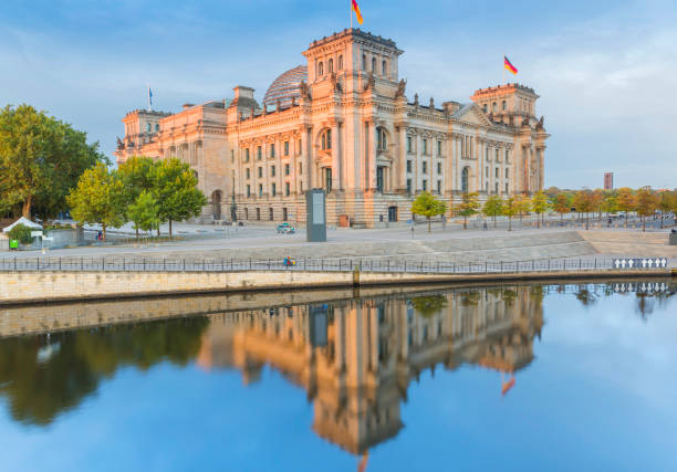 istock Berlin Germany Reichstag at sunrise with river Spree 858239706