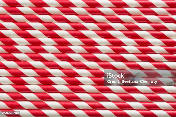 Christmas Red Straws As Background Top View Pattern Stock Photo - Download Image Now