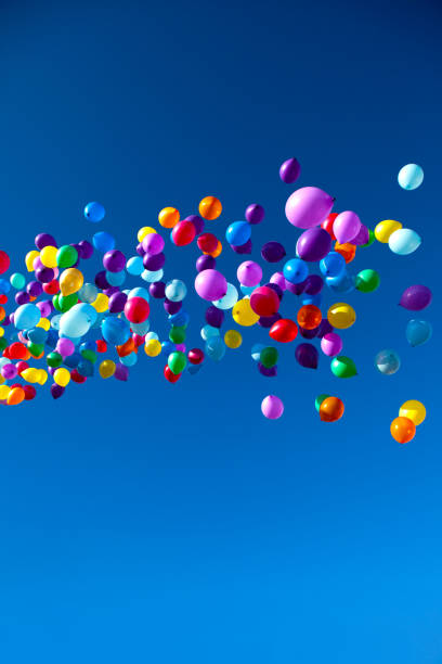 istock Colorful Balloons flying in the sky party 858244062
