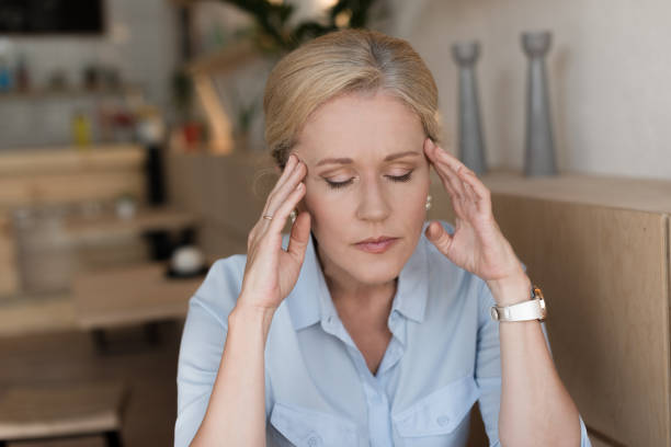 istock stressed mature woman 858244772