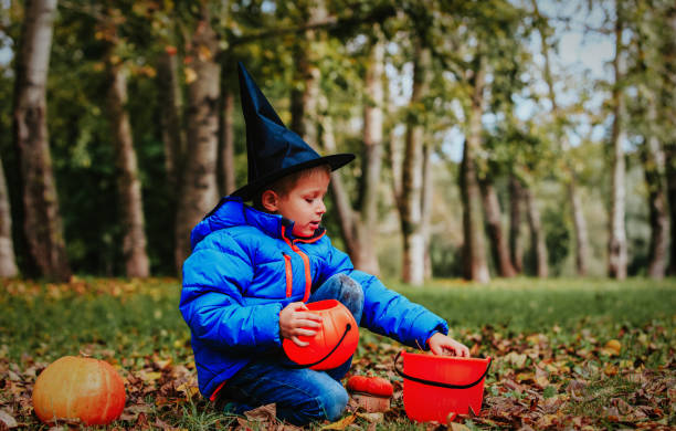 istock little boy get ready for halloween party 858245484
