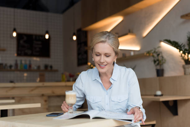 woman drinking coffee at cafe