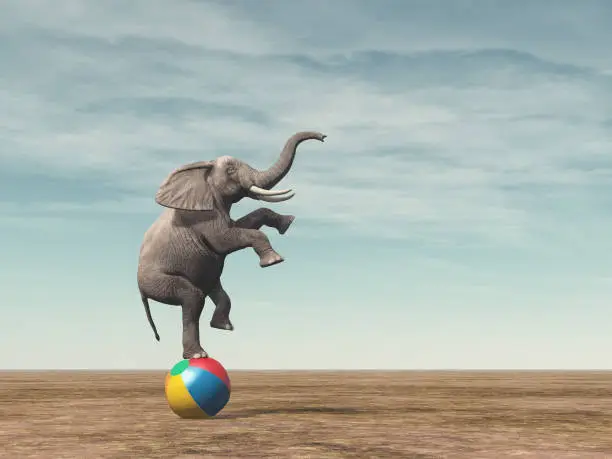 Surreal image of an elephant balancing on a beach ball - 3d render illustration