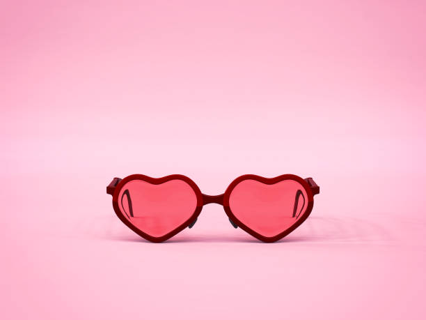 istock Heart shape sun glasses on pink background 858259860