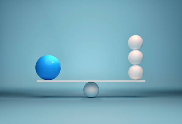 istock Spheres in balance - leadership and team. 858259880