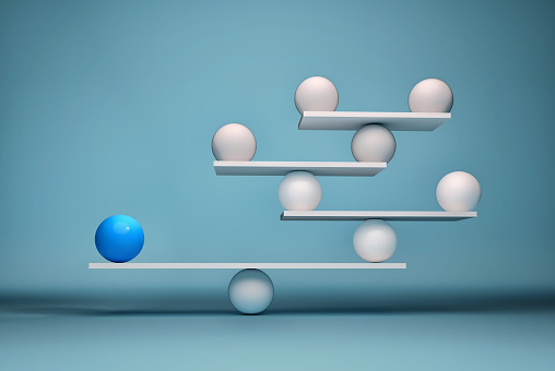 Leadership balancing the team - sphere in balance. This is a 3d render illustration