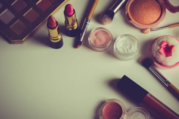 istock beauty concept : cosmetics top view on a white table. Workplace, cosmetic bag 858266996
