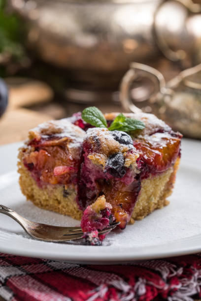 istock Yeast cake with plums and blueberries. 858271812