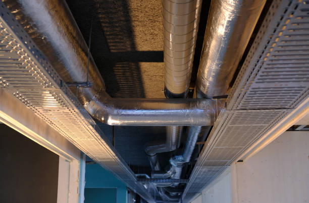 istock Ventilation network pipes in silver insulation material with cable ladder 858273248