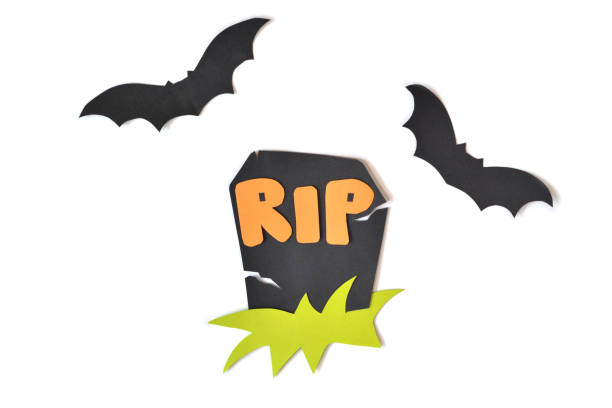istock Halloween tomb and bat on white background 858276550