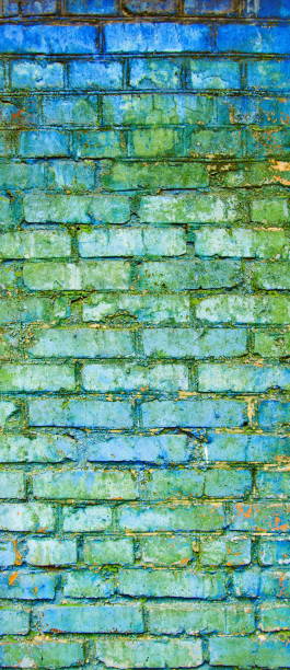istock Texture of old blue and gray brick wall surface with cement and concrete seams 858290186
