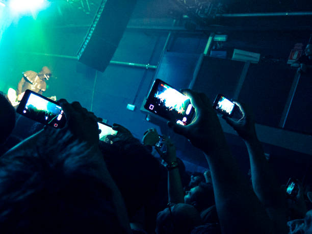istock Concert crowd in front of a live stage 858293432