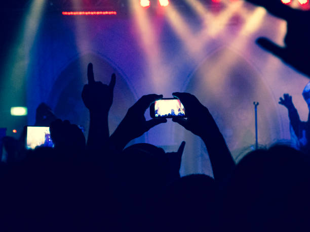 istock Concert crowd in front of a live stage 858293436