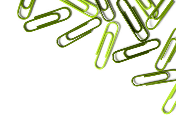 istock Green paper clips on a white background (46 megapixels) 858293866