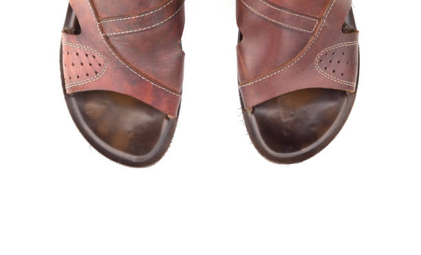 istock Men's leather sandals isolated on white background top view 858301874