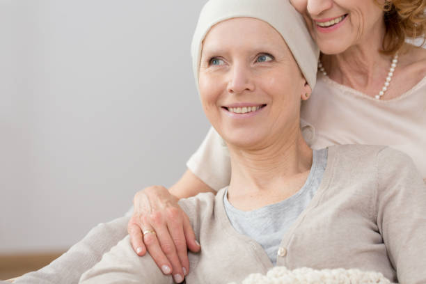 istock Cancer survivor lying in embrace 858302902