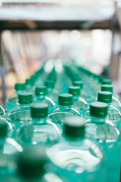 istock Water bottling factory 858309436