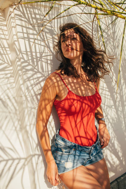istock Woman in the sun 858312406