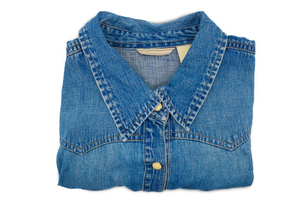 istock Top view folded blue jeans jacket isolated on white background 858322030
