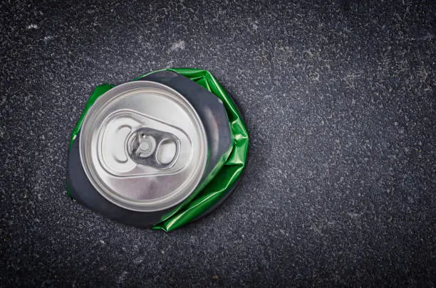 Photo of Crushed aluminum beer can