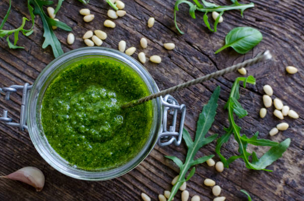 istock Homemade arugula pesto in a glass jar 858322960