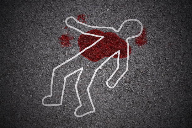 white shape of body and blood stains on asphalt texture