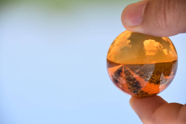 istock Field lettuce through a crystal ball 858328592